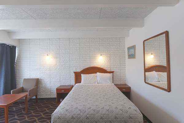 Foto van Queensize bed | Smk | Breezewood - Vakantiehuis in Breezewood - BedRoom