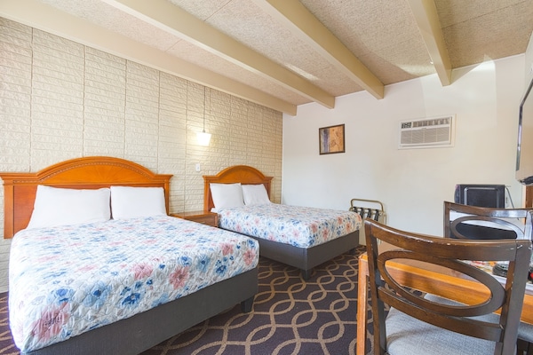 Foto van 2 tweepersoonsbedden | Rookvrij - Vakantiehuis in Breezewood - BedRoom