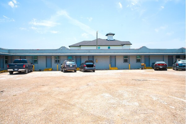Foto van Corpus Christi, Texas | Queensize bed - Vakantiehuis in Corpus Christi TX - parking