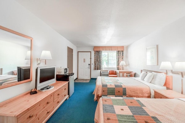 Foto van Luxe kamer met 2 queensize bedden en balkon - Vakantiehuis in Eureka Springs - BedRoom