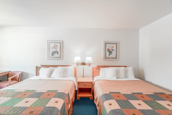 Foto van Luxe kamer met 2 queensize bedden en balkon - Vakantiehuis in Eureka Springs - BedRoom