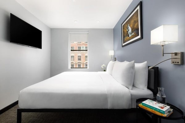 Foto van Toegankelijk comfort|Queensize bed |Times Square - Vakantiehuis in New York - BedRoom