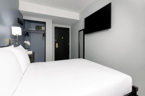 Foto van Toegankelijk comfort|Queensize bed |Times Square - Vakantiehuis in New York - BedRoom