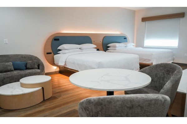 Foto van Premium kamer met twee queensize bedden - - Vakantiehuis in Port Aransas, TX - BedRoom