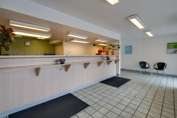 Foto van 1 tweepersoonsbed | Premium minikoelkast - Vakantiehuis in Kissimmee - HallReception