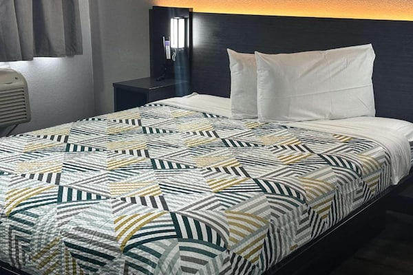 Foto van 1 tweepersoonsbed | Premium minikoelkast - Vakantiehuis in Kissimmee - BedRoom