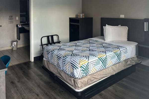 Foto van 1 tweepersoonsbed | Premium minikoelkast - Vakantiehuis in Kissimmee - BedRoom